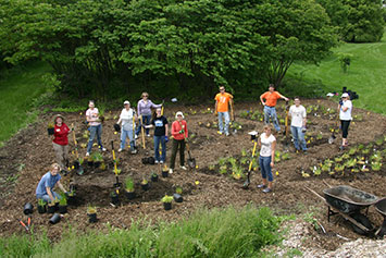 Volunteers planting a garden. Link to Gifts of Cash, Checks, and Credit Cards
