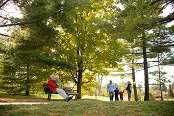 People hiking at The Morton Arboretum. Link to Life Stage Gift Planner Over Age 70 Situations.